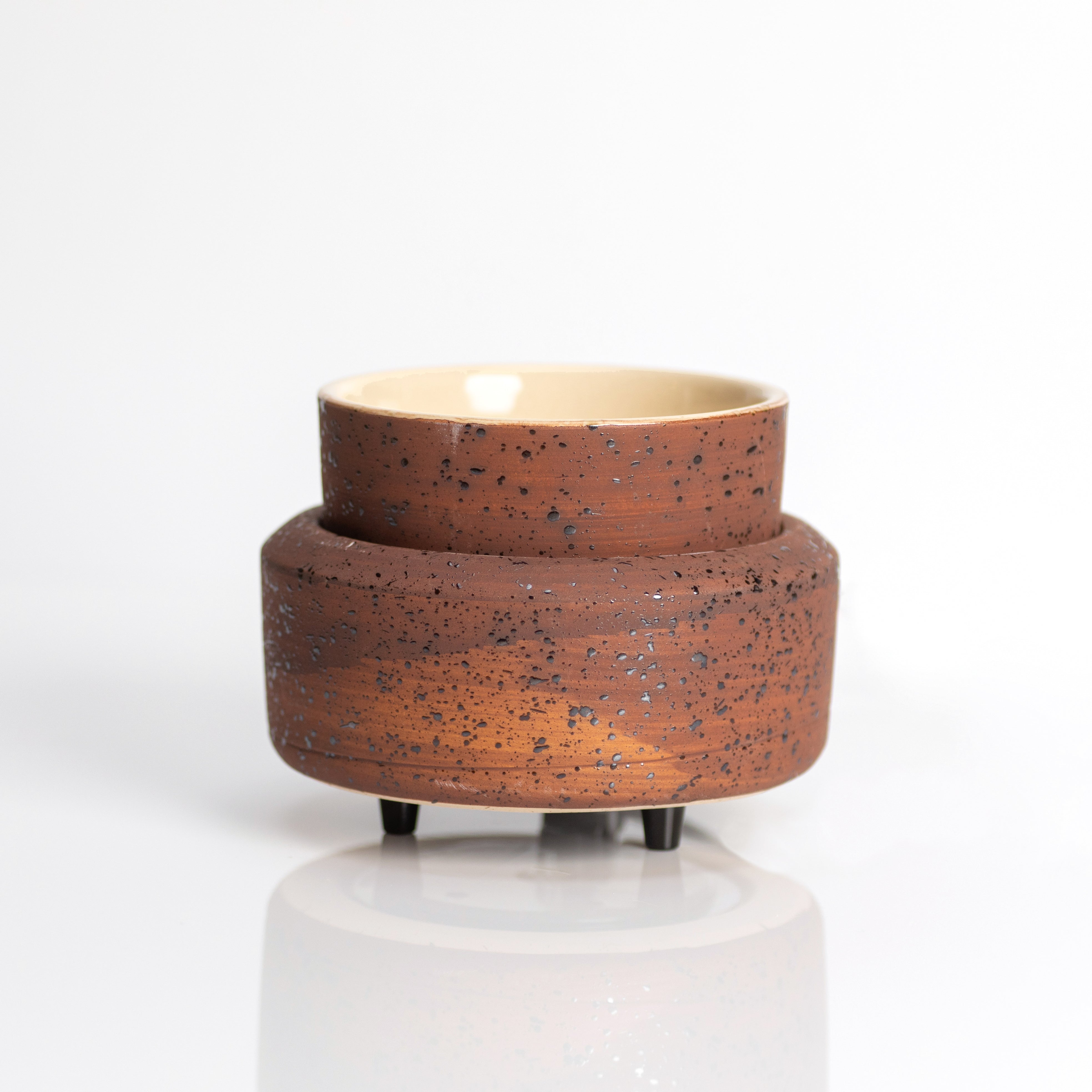 Minimalist Illuminating Fragrance Warmer, handcrafted brown ceramic piece, perfect for scent diffusion and home decor elegance.