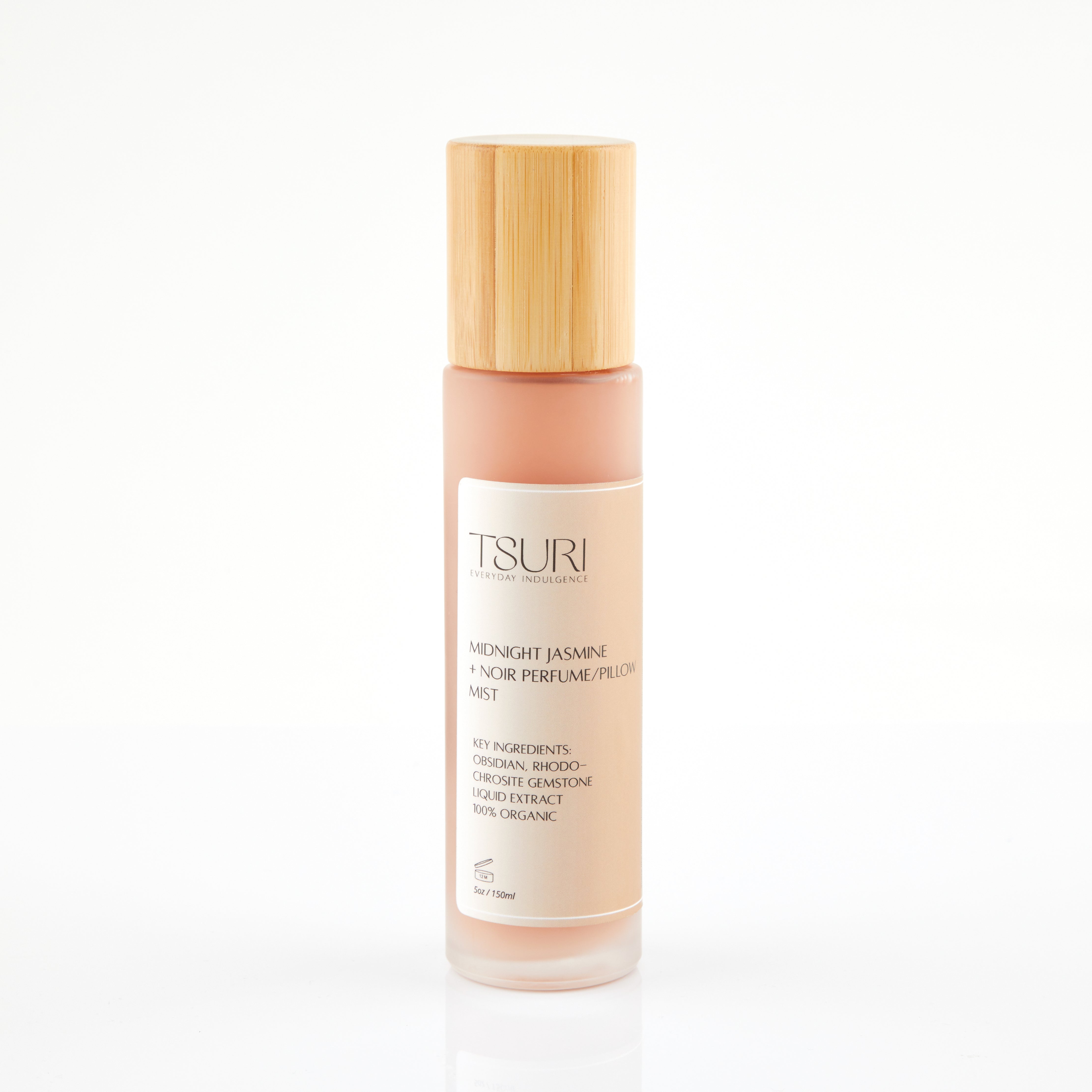 Midnight Jasmine + Noir Perfume Mist bottle with bamboo cap infused with gemstone extract for antioxidant protection and balance.