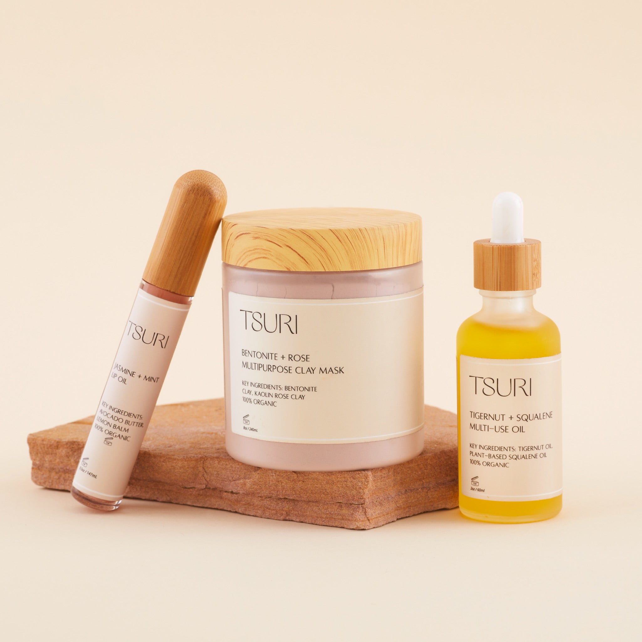 Skincare Ritual Kit with lip oil, squalene multiuse oil, and rose clay mask for nourishing and radiant skin.