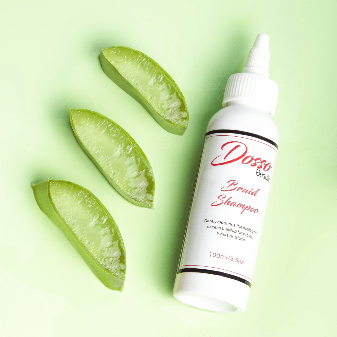 Dosso Beauty Organic Braid Shampoo with aloe pieces on green background, ideal for cleansing braids, twists, and edges.