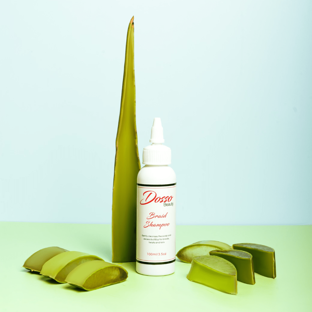 Dosso Beauty Organic Braid Shampoo bottle with aloe vera slices, ideal for protective styles and clean scalp maintenance.