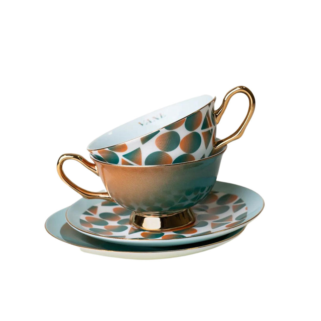 Monogram Tea Set with Gullah-inspired design and gold accents, including an 8oz bone China cup and saucer by Lynae Vanee.