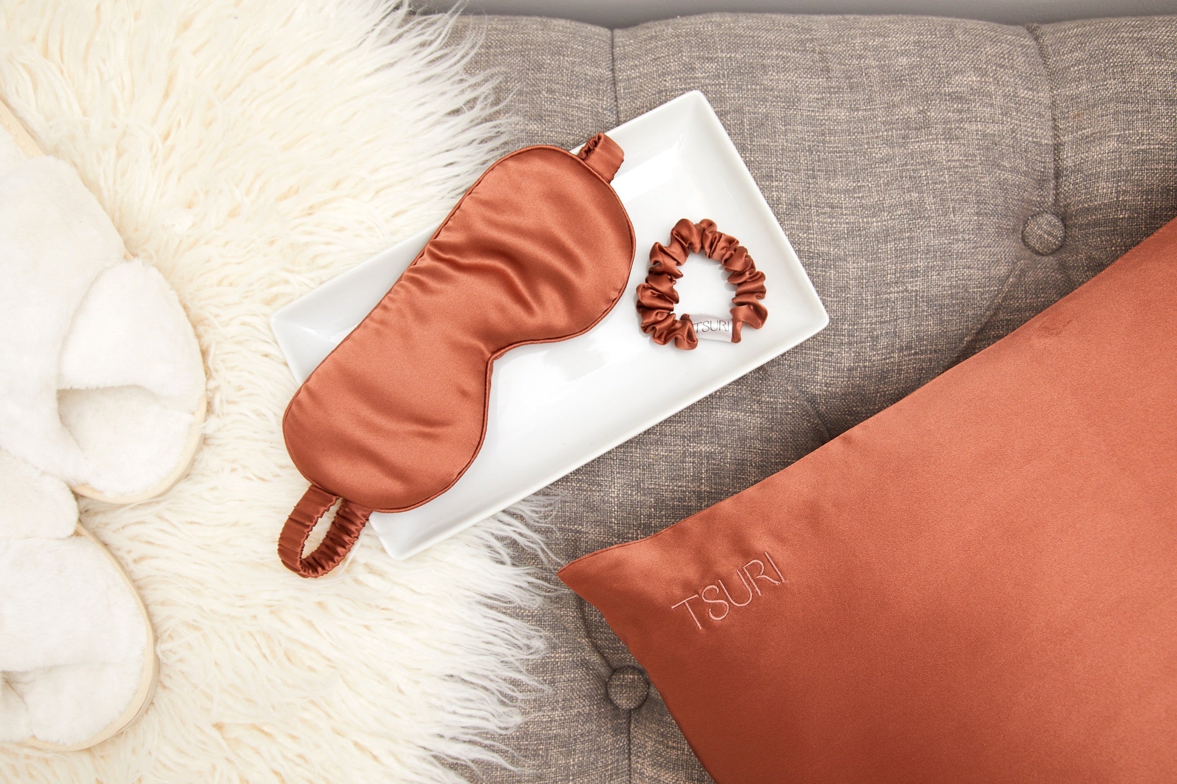 Luxury Mulberry Silk Sleep Set with pillowcase, sleep mask, and scrunchie in warm hue, perfect for reducing wrinkles and frizz.