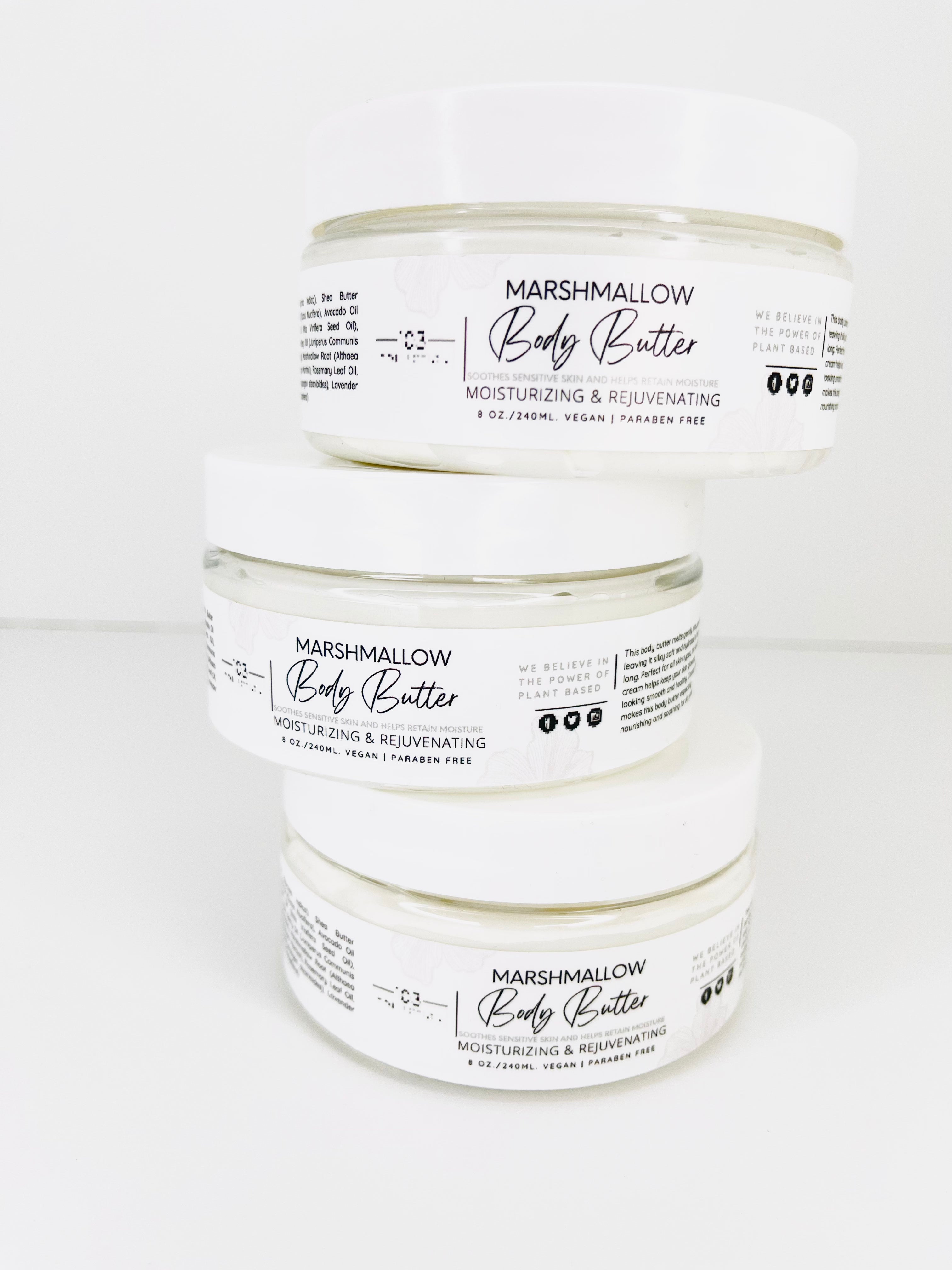 Three jars of Marshmallow Body Butter stacked, showcasing moisturizing and rejuvenating skincare for sensitive skin.