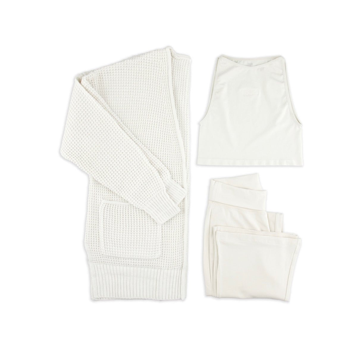 Limited edition bone loungewear set featuring a cardigan and matching separates, crafted from luxurious cotton and bamboo rayon.