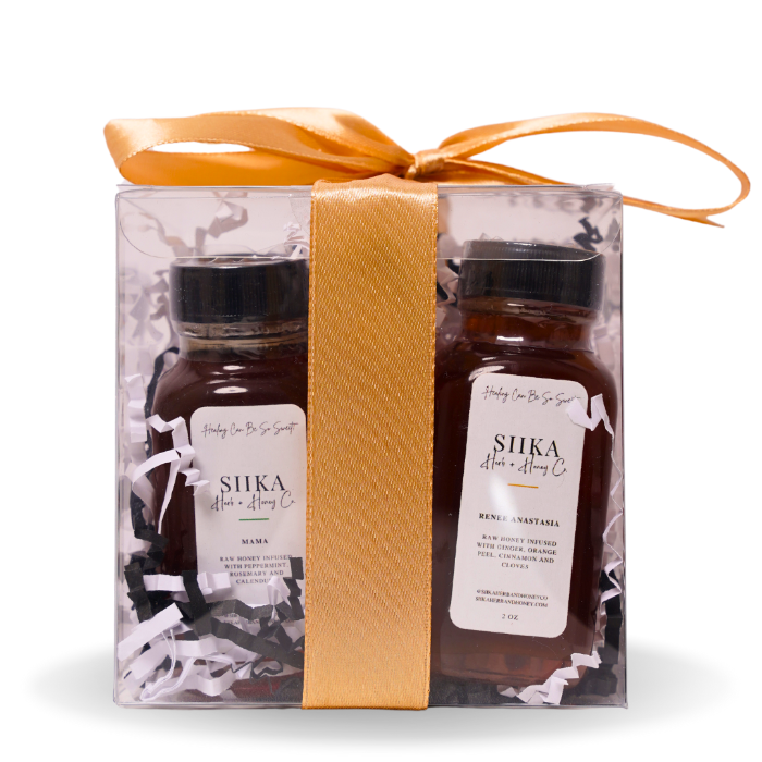 Gift-packaged Infused Honey Discovery Set featuring handcrafted honey jars with herbs and spices, perfect for gifting or personal use.
