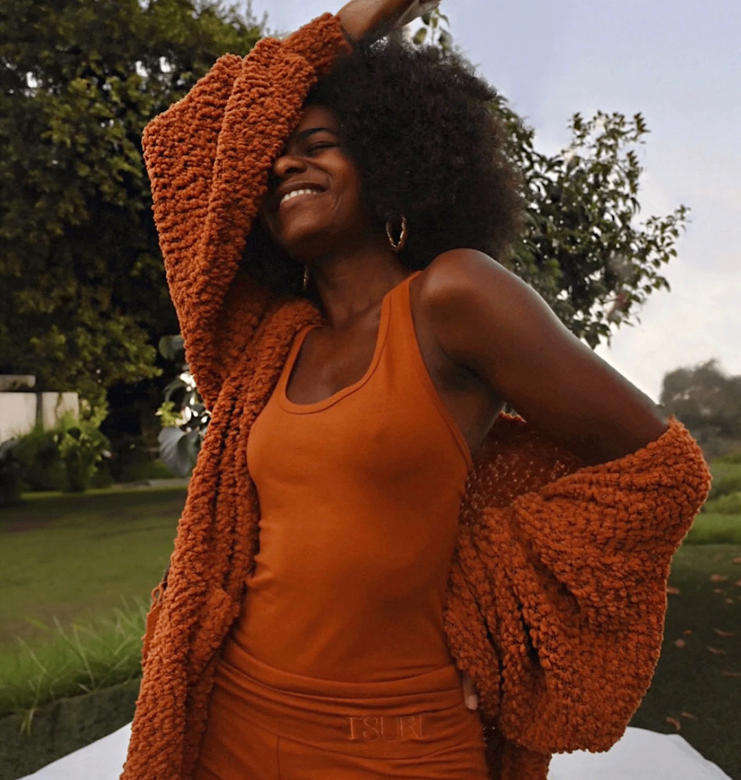 Woman wearing Limited Edition Lounge Set in Sirrocco, enjoying comfort and style outdoors; part of Cozy Collection loungewear.